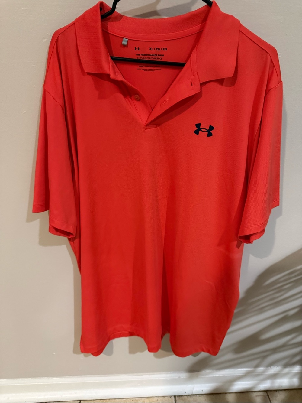 Under Armour Men’s Coral-Red Golf Polo with Logo